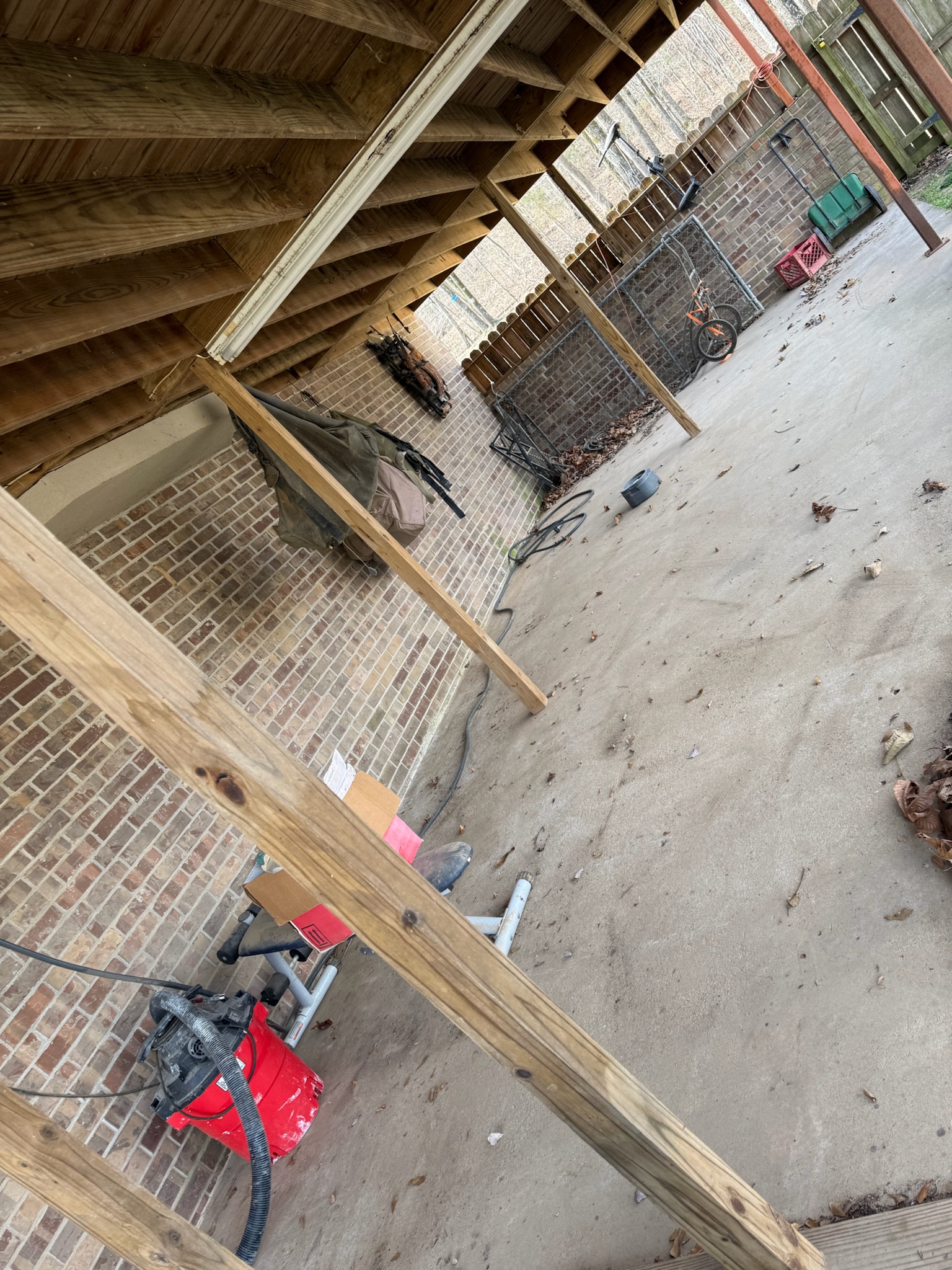 Covered patio after appliance and junk removal